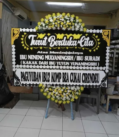 Papan Bunga Duka Parigi